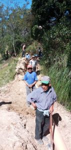 Group of volunteers install water line in San Miguel